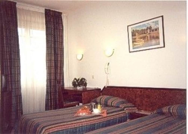 Imagen de la habitación del Hotel De Nevers. Foto 17