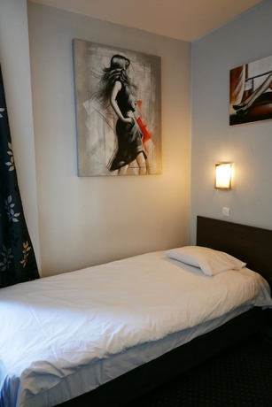 Imagen de la habitación del Hotel De Normandie, Lyon. Foto 9