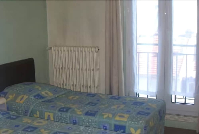 Imagen de la habitación del Hotel De Paris Et Des Voyageurs. Foto 3