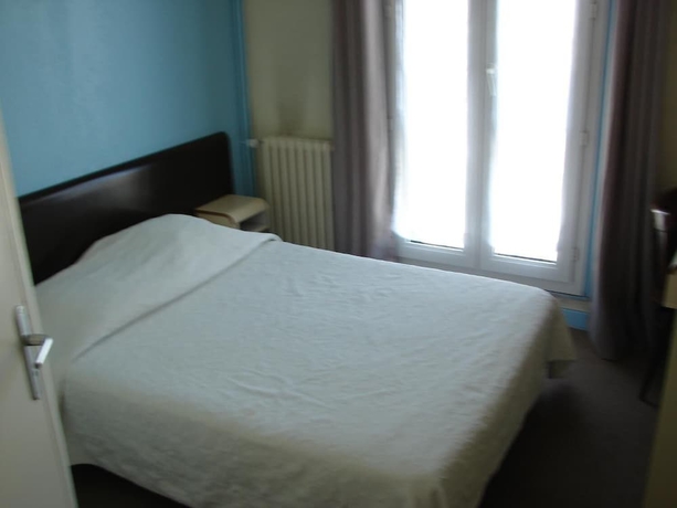 Imagen de la habitación del Hotel De Paris Et Des Voyageurs. Foto 7