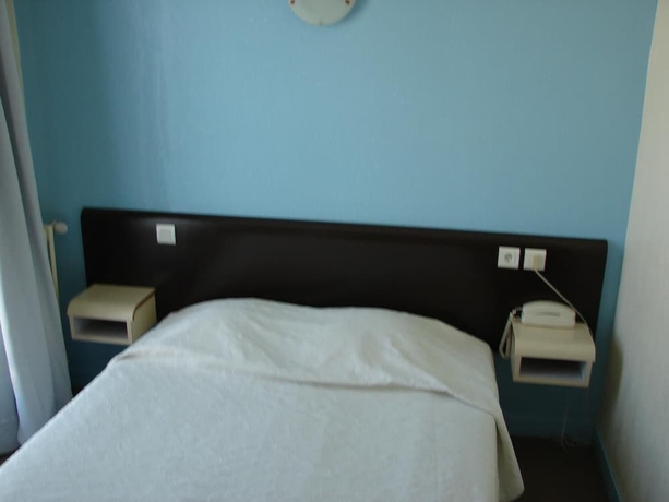 Imagen de la habitación del Hotel De Paris Et Des Voyageurs. Foto 8