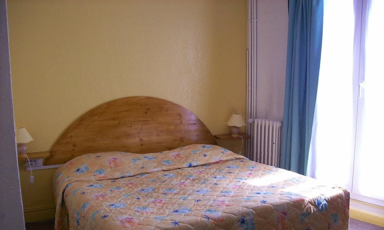 Imagen de la habitación del Hotel De Paris Et Des Voyageurs. Foto 9