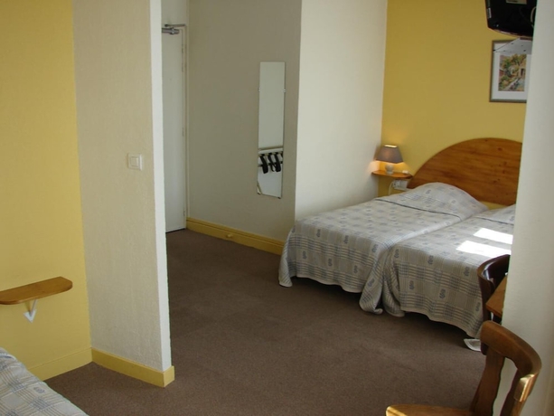 Imagen de la habitación del Hotel De Paris Et Des Voyageurs. Foto 11