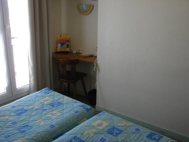 Imagen de la habitación del Hotel De Paris Et Des Voyageurs. Foto 13