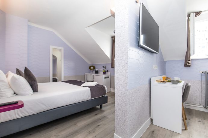 Imagen de la habitación del Hotel De Paris Montparnasse. Foto 6