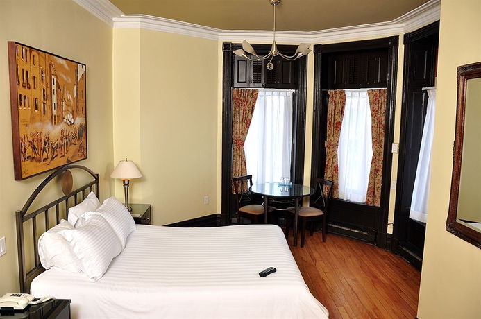 Imagen de la habitación del Hotel De Paris, Montreal. Foto 3