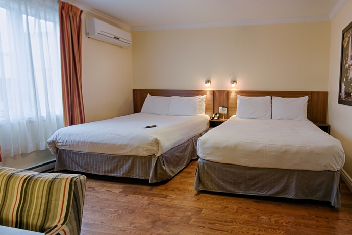 Imagen de la habitación del Hotel De Paris, Montreal. Foto 6