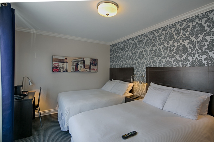 Imagen de la habitación del Hotel De Paris, Montreal. Foto 8