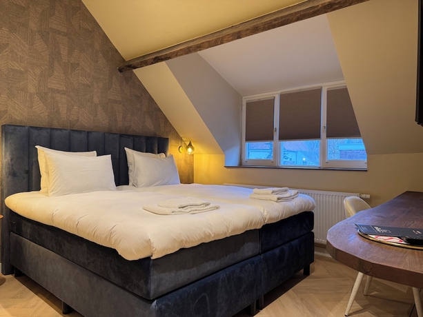 Imagen de la habitación del Hotel De Pastorie Bed and Breakfast. Foto 2