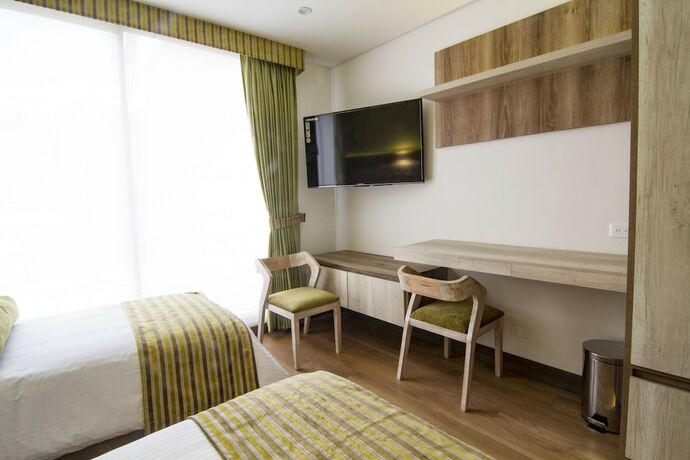 Imagen de la habitación del Hotel De Película Apartasuites. Foto 13