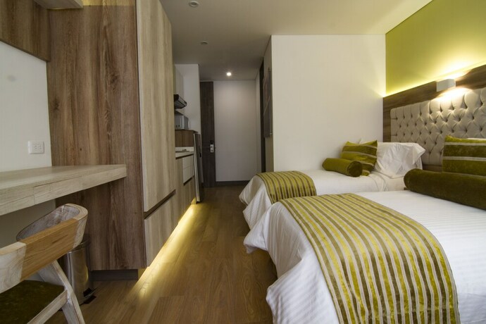 Imagen de la habitación del Hotel De Película Apartasuites. Foto 14