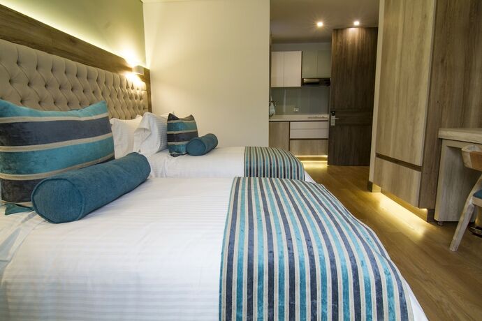 Imagen de la habitación del Hotel De Película Apartasuites. Foto 21