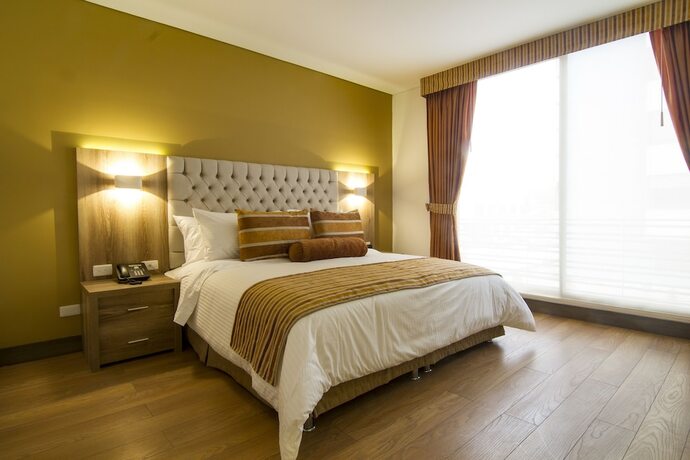 Imagen de la habitación del Hotel De Película Apartasuites. Foto 30