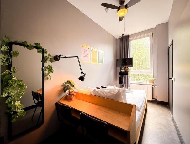 Imagen de la habitación del Hotel De Pijp Boutique. Foto 7