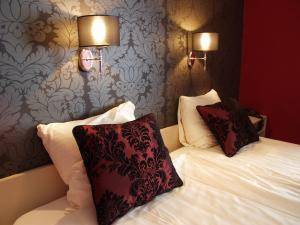 Imagen de la habitación del Hotel De Postelse Hoeve. Foto 5