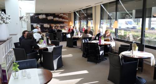 Imagen del bar/restaurante del Hotel De Postelse Hoeve. Foto 4