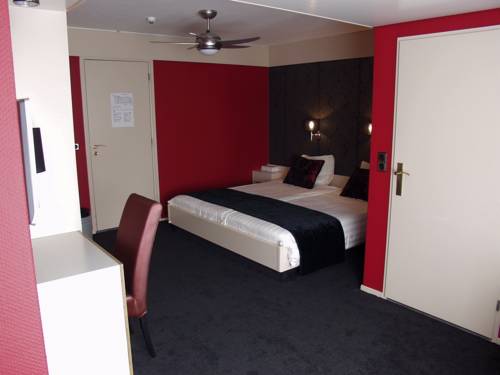 Imagen de la habitación del Hotel De Postelse Hoeve. Foto 8