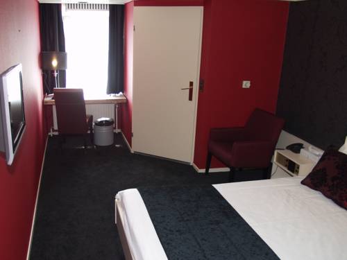 Imagen de la habitación del Hotel De Postelse Hoeve. Foto 9