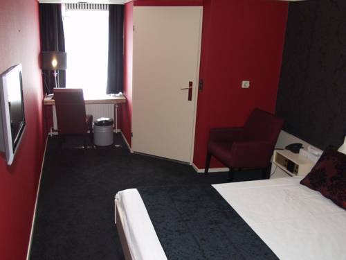 Imagen de la habitación del Hotel De Postelse Hoeve. Foto 10