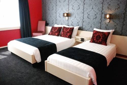 Imagen de la habitación del Hotel De Postelse Hoeve. Foto 11