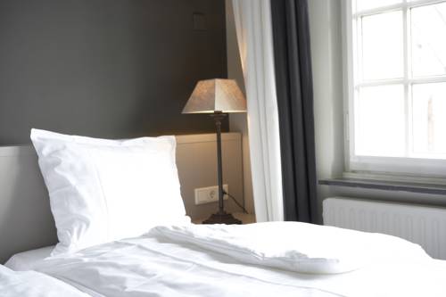 Imagen de la habitación del Hotel De Prins. Foto 6