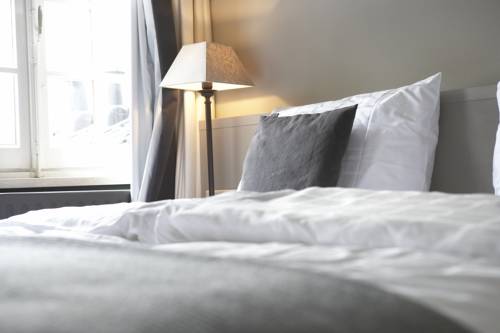 Imagen de la habitación del Hotel De Prins. Foto 7