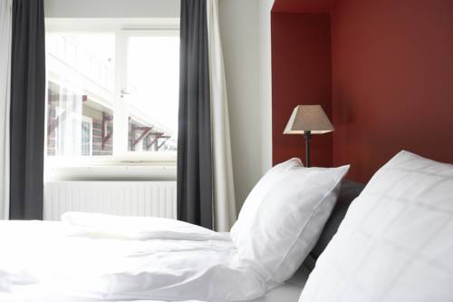 Imagen de la habitación del Hotel De Prins. Foto 11