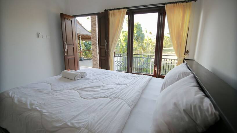 Imagen de la habitación del Hotel De Puri Bingin. Foto 5