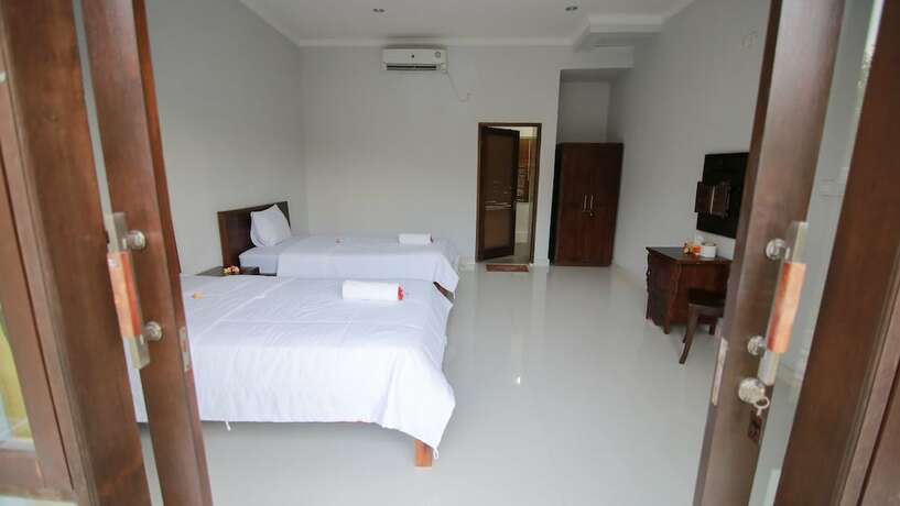 Imagen de la habitación del Hotel De Puri Bingin. Foto 11