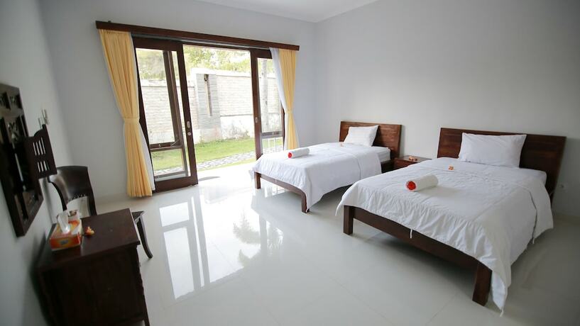 Imagen de la habitación del Hotel De Puri Bingin. Foto 12