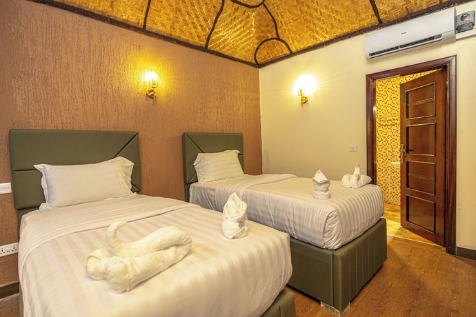 Imagen de la habitación del Hotel De Rain Eco Beach Resort. Foto 4