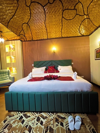 Imagen de la habitación del Hotel De Rain Eco Beach Resort. Foto 8