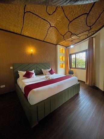 Imagen de la habitación del Hotel De Rain Eco Beach Resort. Foto 10