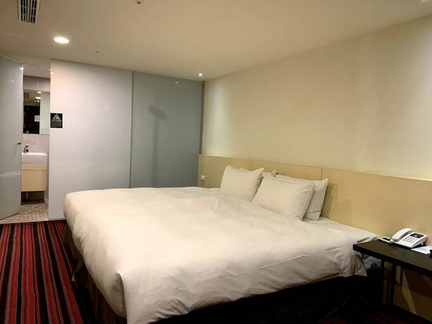 Imagen de la habitación del Hotel De R&ecirc;ve Express. Foto 13
