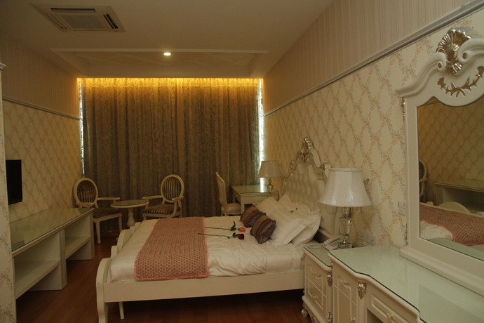Imagen de la habitación del Hotel De Residence Boutique. Foto 8