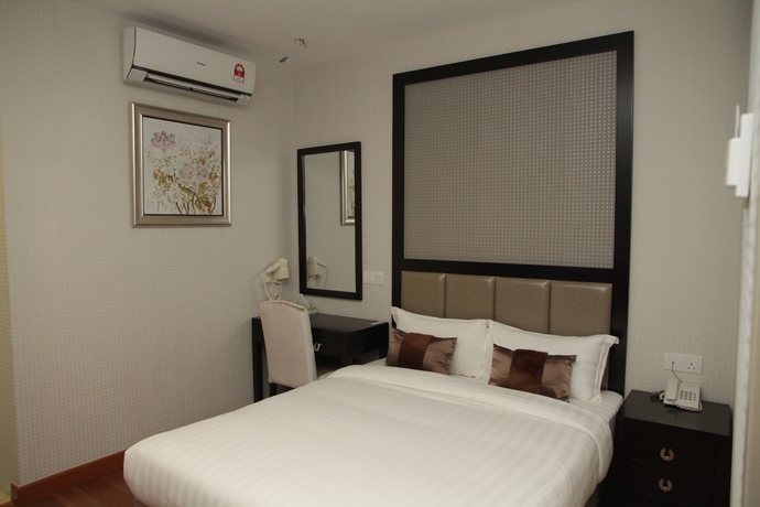 Imagen de la habitación del Hotel De Residence Boutique. Foto 10