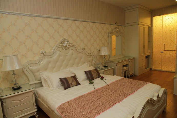 Imagen de la habitación del Hotel De Residence Boutique. Foto 16