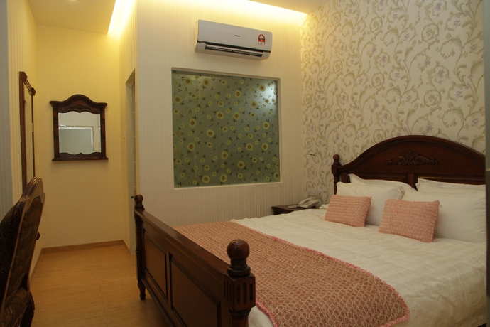 Imagen de la habitación del Hotel De Residence Boutique. Foto 17