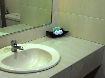 Imagen de la habitación del Hotel De Rhu Beach Resort. Foto 11