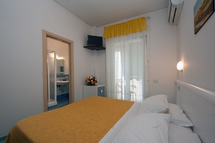 Imagen de la habitación del Hotel De Rosa. Foto 10