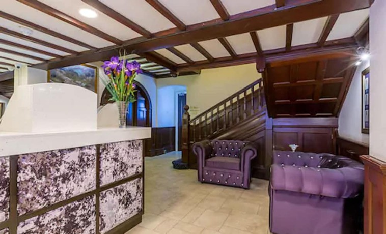 Imagen de los interiores del Hotel De Rougemont Manor and Suites. Foto 16