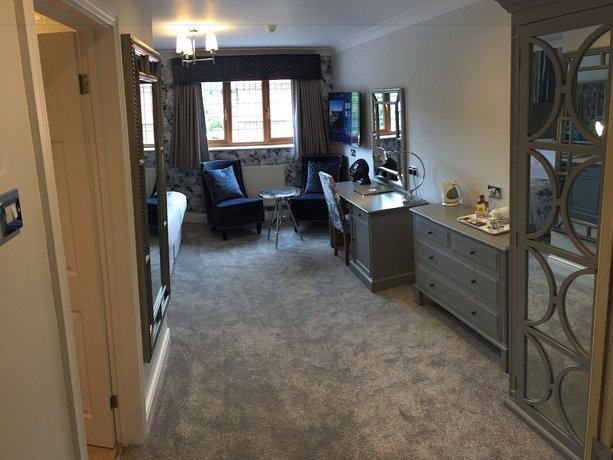 Imagen de la habitación del Hotel De Rougemont Manor and Suites. Foto 5