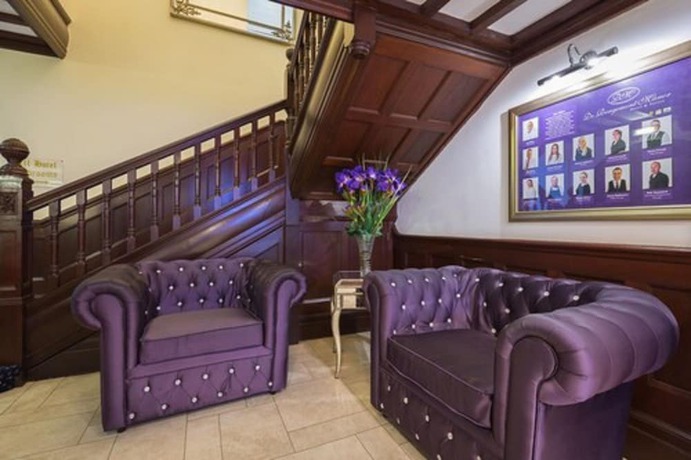 Imagen de los interiores del Hotel De Rougemont Manor and Suites. Foto 17