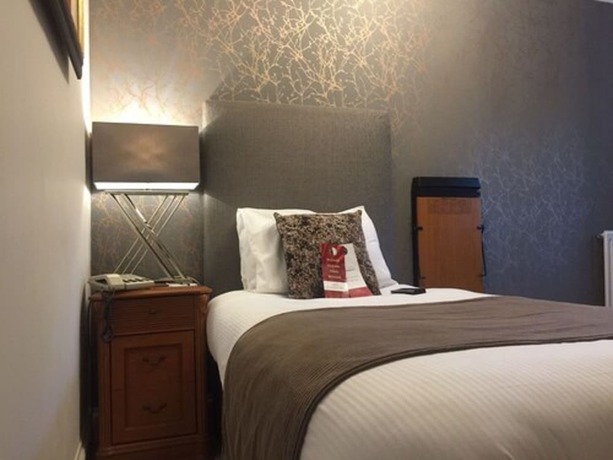 Imagen de la habitación del Hotel De Rougemont Manor and Suites. Foto 12