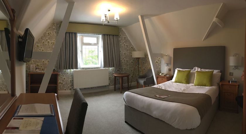 Imagen de la habitación del Hotel De Rougemont Manor and Suites. Foto 13