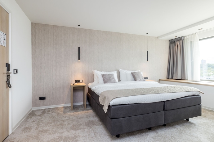 Imagen de la habitación del Hotel De Rousch. Foto 12