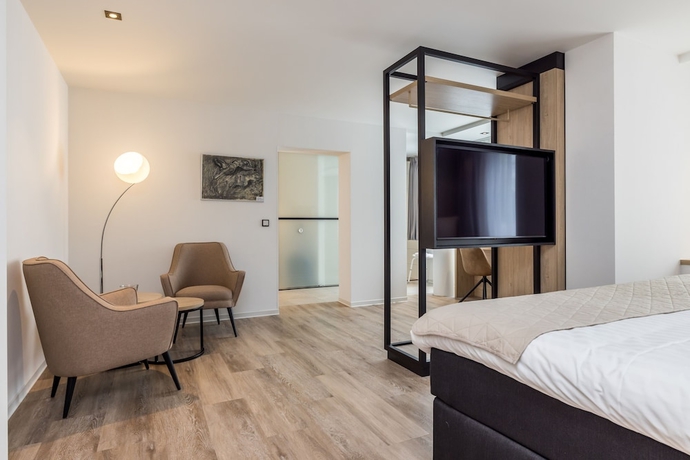 Imagen de la habitación del Hotel De Rousch. Foto 16