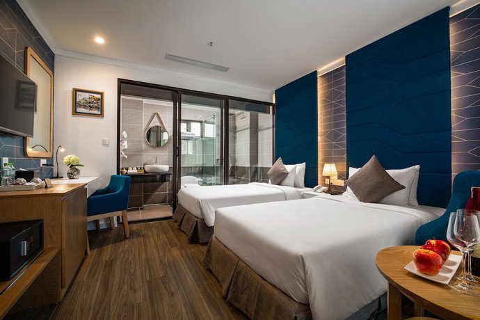 Imagen de la habitación del Hotel De SOURIANT Central Hanoi. Foto 6