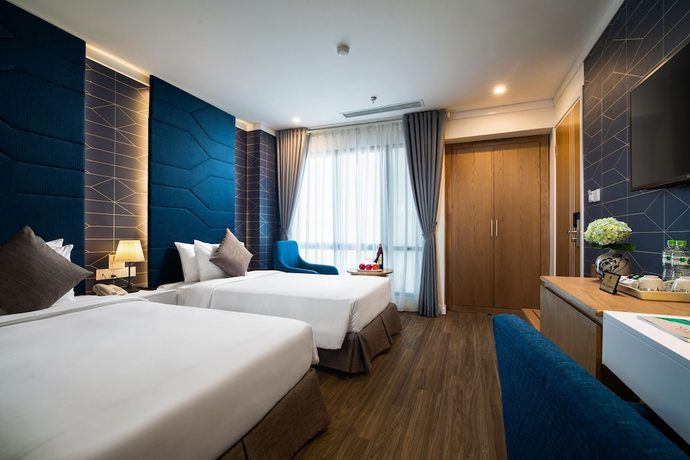 Imagen de la habitación del Hotel De SOURIANT Central Hanoi. Foto 17