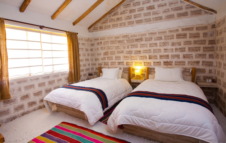 Imagen de la habitación del Hotel De Sal Luna Salada. Foto 11